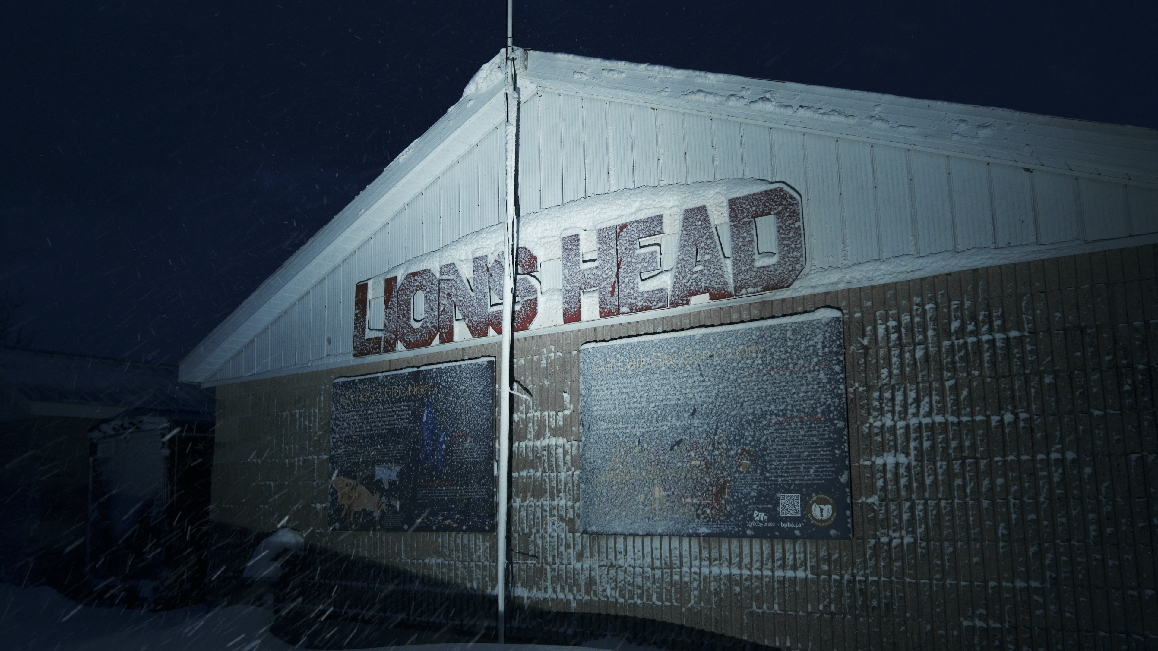 Lion's Head arena building in a winter snowstorm