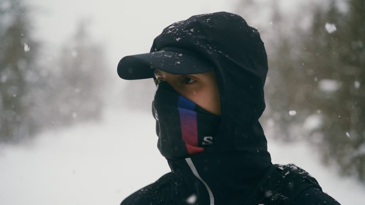 Runner Felix bundled up in Salomon gear in a snowstorm
