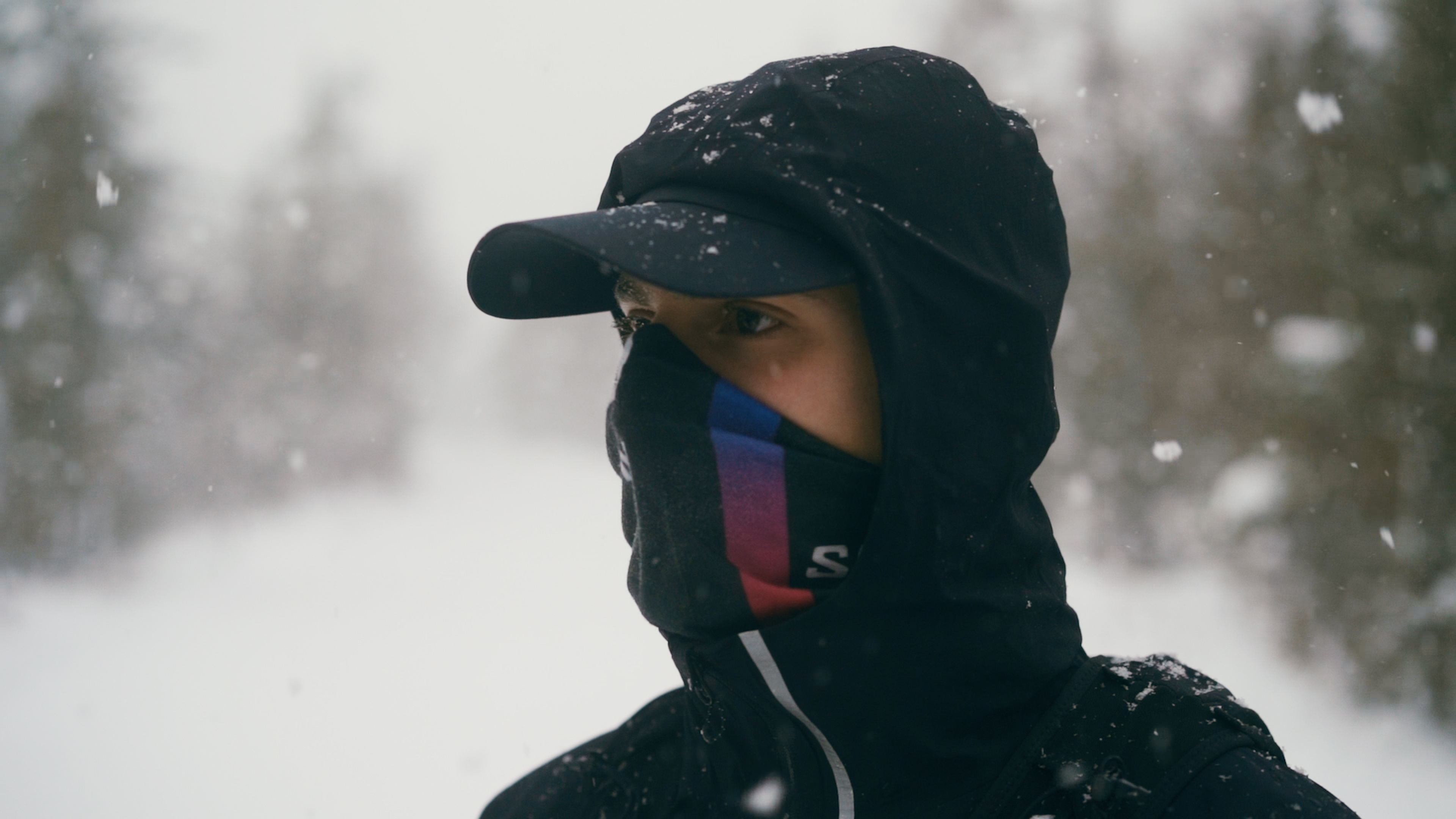 Runner Felix bundled up in Salomon gear in a snowstorm